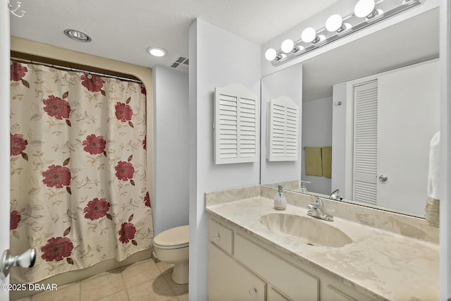 bathroom featuring shower / bath combination with curtain, tile patterned flooring, vanity, and toilet