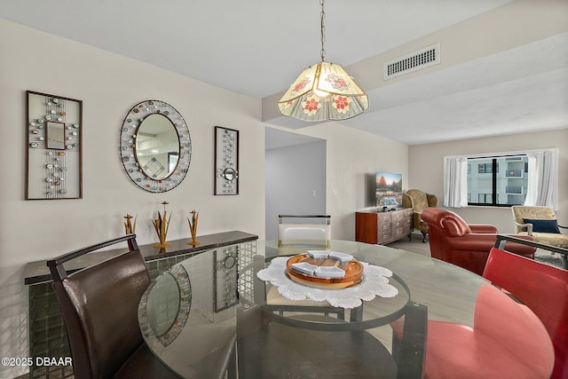 dining area featuring visible vents