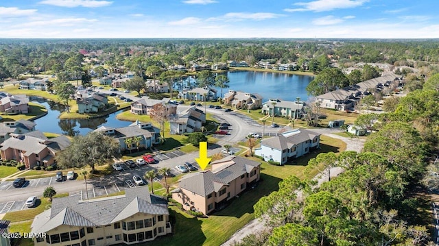 bird's eye view with a water view