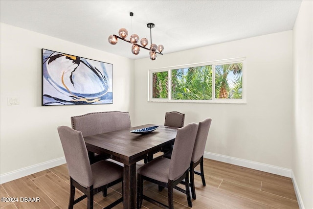 dining space with light hardwood / wood-style flooring