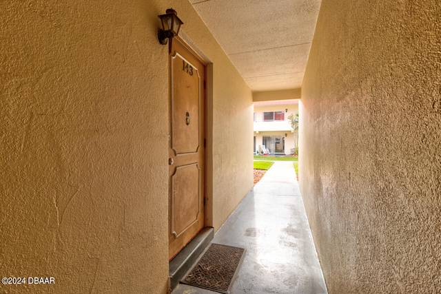 corridor with concrete floors