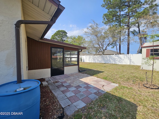 view of yard with fence and a patio area