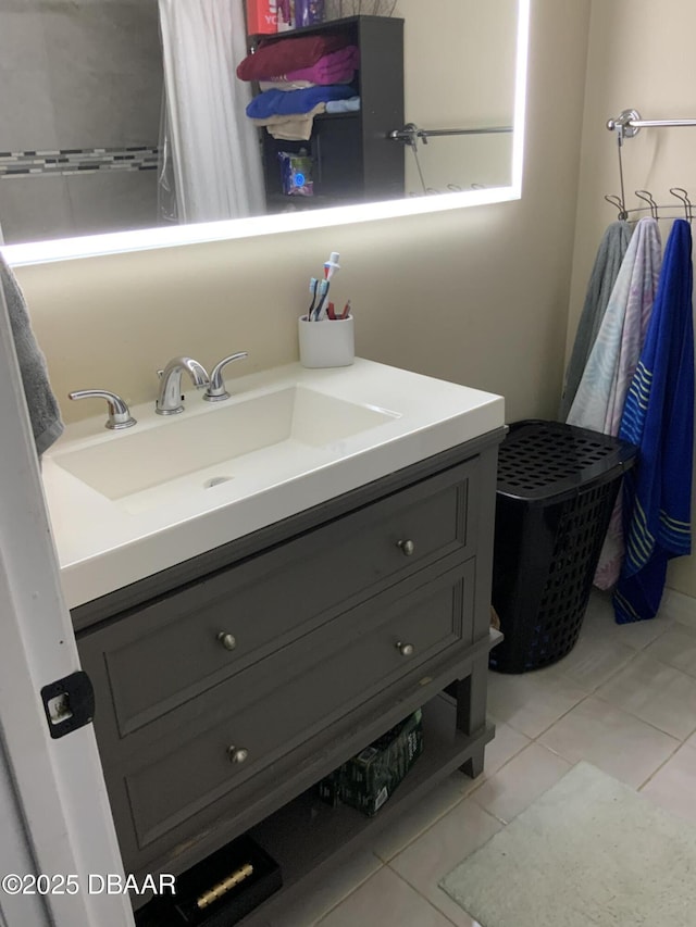 bathroom with vanity and tile patterned floors