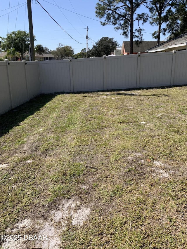 view of yard featuring fence