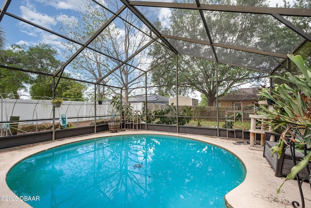 view of pool with a fenced in pool, a lanai, and a fenced backyard