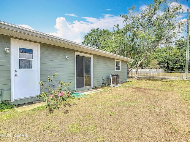 244 Oakleigh Dr, Deland, FL 32724 - rear view of property featuring central AC