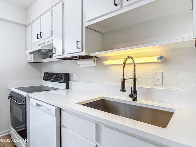 244 Oakleigh Dr, Deland, FL 32724 - kitchen featuring range with electric stovetop, dishwasher, a sink, light countertops, and white cabinets
