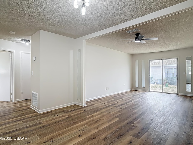 244 Oakleigh Dr, Deland, FL 32724 - empty room with a textured ceiling, wood finished floors, ceiling fan, and baseboards