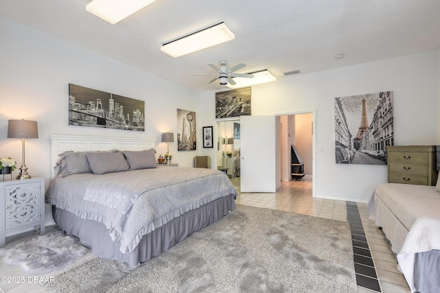 bedroom with visible vents and a ceiling fan