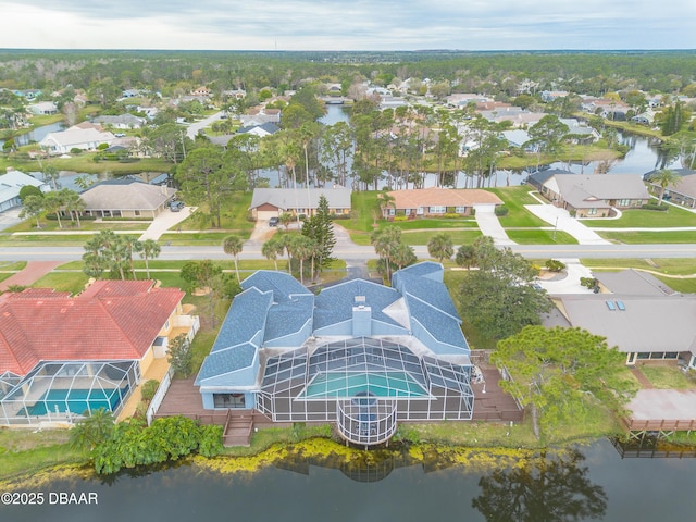 aerial view featuring a residential view and a water view