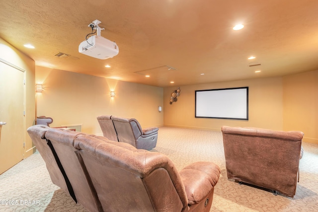 carpeted cinema room featuring visible vents, recessed lighting, and baseboards