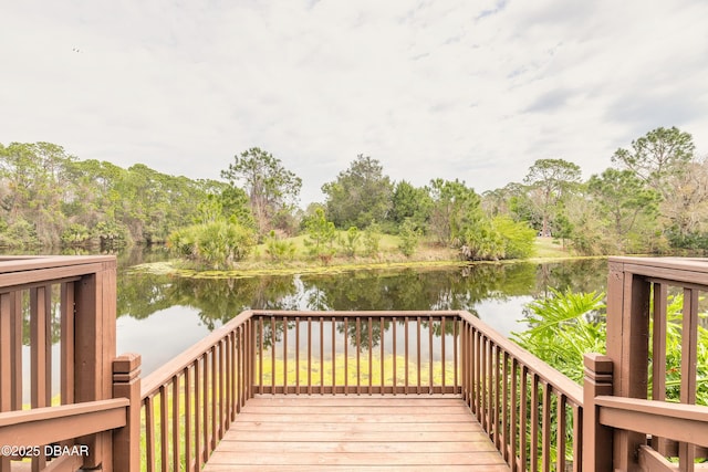 wooden terrace with a water view