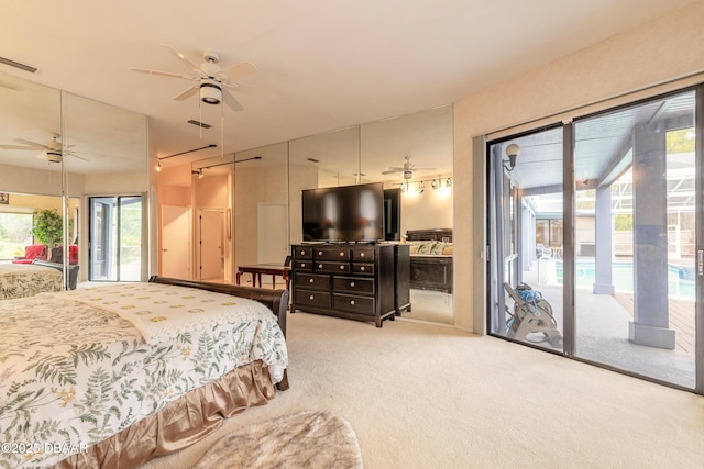 bedroom featuring access to exterior, carpet flooring, and visible vents