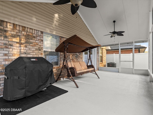 view of patio with area for grilling and ceiling fan