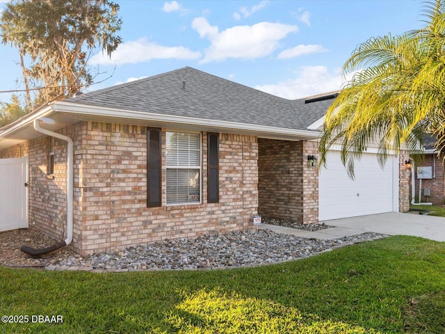 view of front of house with a garage and a front yard