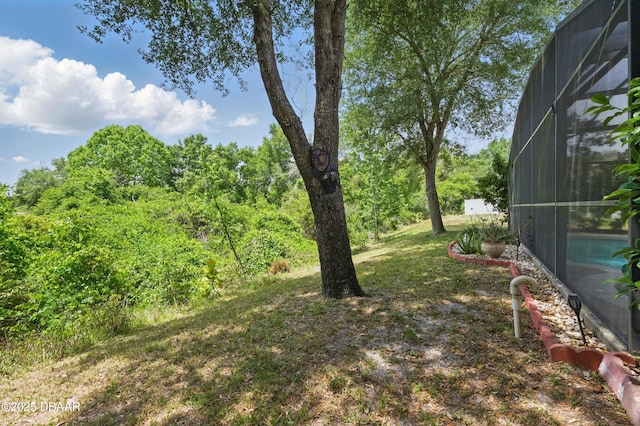3348 Heath Dr, Deltona, FL 32725 - view of yard featuring a lanai