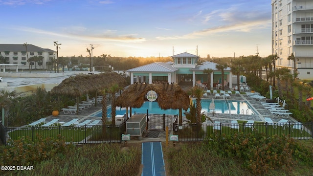 dock area featuring a community pool and a gazebo