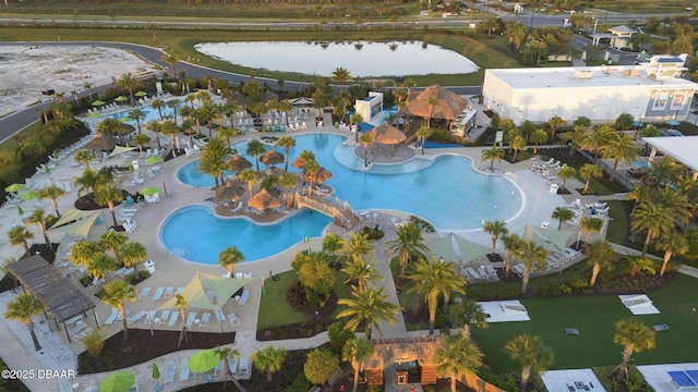 birds eye view of property featuring a water view