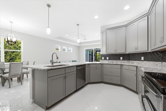 kitchen with gray cabinets, dishwasher, sink, and kitchen peninsula