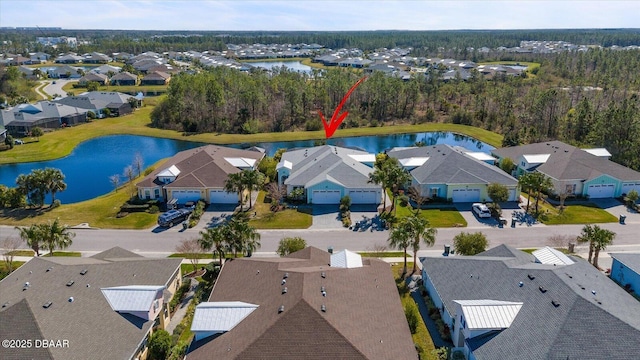 birds eye view of property featuring a water view