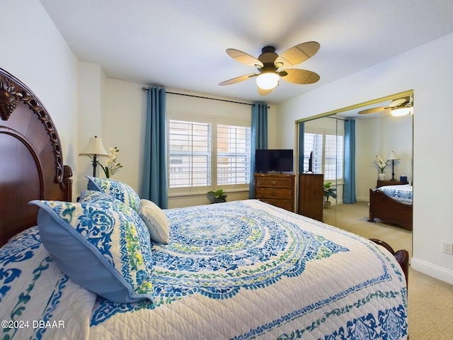 4670 Links Village Dr Unit C601, Ponce Inlet, FL 32127 - carpeted bedroom with a closet and ceiling fan