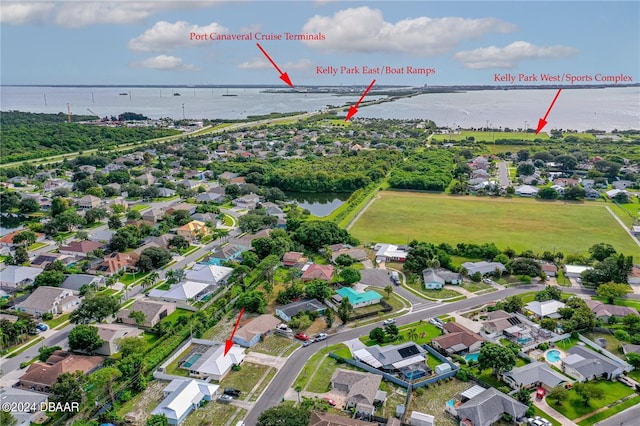 1320 Johns Cir, Merritt Island, FL 32952 - aerial view of property's location featuring a nearby body of water and nearby suburban area