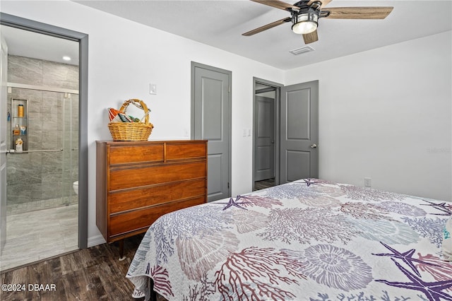 bedroom with ensuite bathroom, dark hardwood / wood-style flooring, and ceiling fan