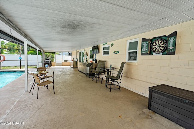 view of patio featuring a fenced in pool