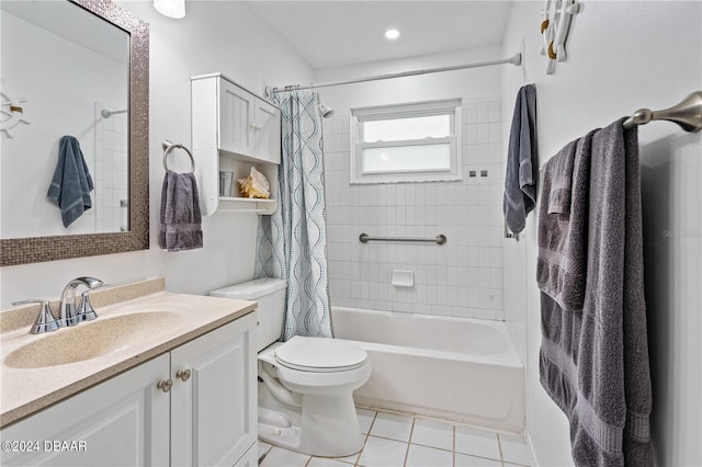 full bathroom featuring toilet, vanity, tile patterned floors, and shower / bathtub combination with curtain