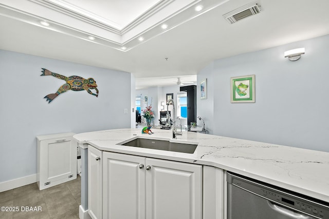 kitchen with white cabinetry, dishwasher, sink, light tile patterned floors, and crown molding