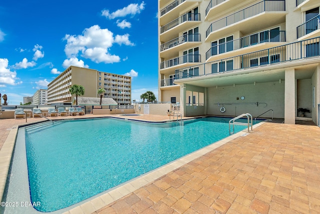 view of pool with a patio area