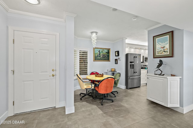 dining room with crown molding