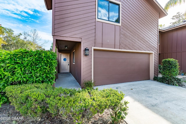 view of front facade featuring a garage and concrete driveway