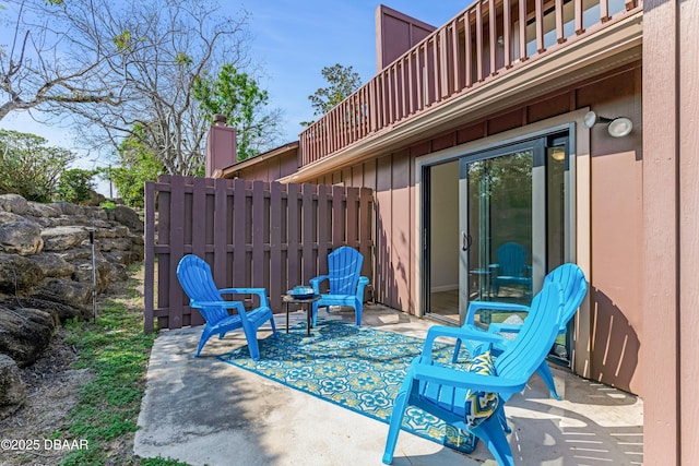 view of patio / terrace featuring a balcony