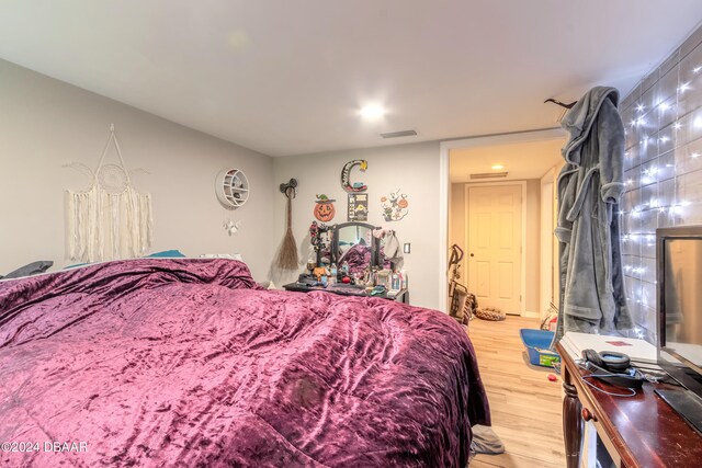 bedroom featuring hardwood / wood-style flooring