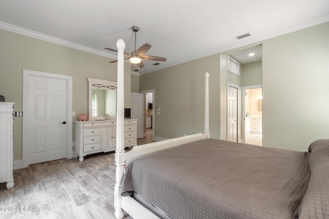 bedroom featuring light wood-type flooring, ceiling fan, and crown molding