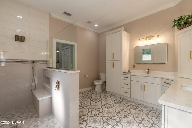 bathroom featuring ornamental molding, vanity, a shower, toilet, and tile walls