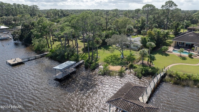 1949 Bayview Dr, New Smyrna Beach, FL 32168 - aerial view of a large body of water and a heavily wooded area