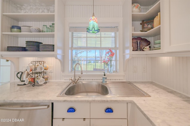 1949 Bayview Dr, New Smyrna Beach, FL 32168 - kitchen featuring open shelves, dishwasher, white cabinets, and pendant lighting