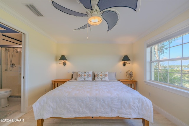 bedroom with connected bathroom, ceiling fan, and crown molding