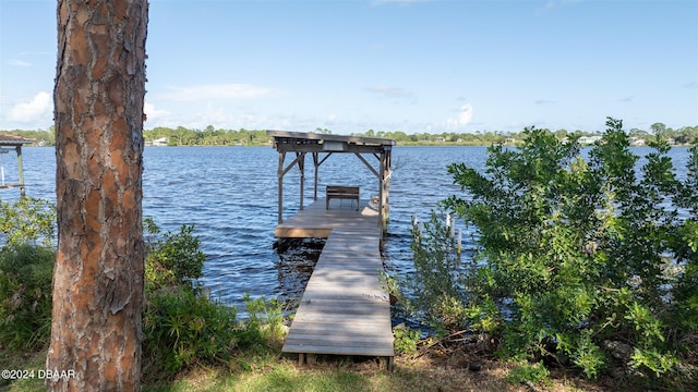 view of dock with a water view