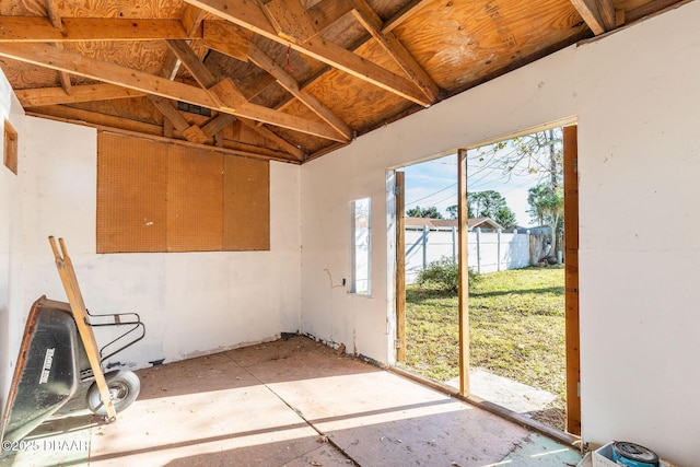 miscellaneous room featuring lofted ceiling