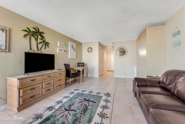 tiled living room with a textured ceiling