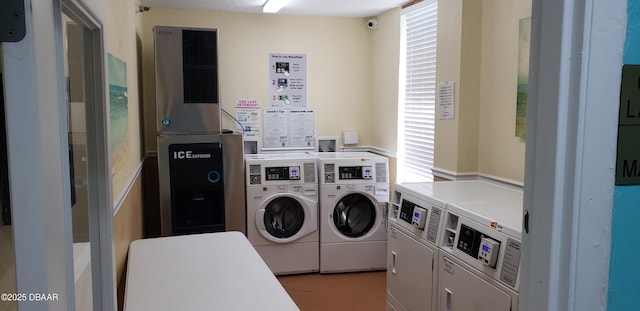 laundry area featuring separate washer and dryer