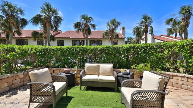 2942 Sea Oats Cir, Daytona Beach, FL 32118 - view of patio / terrace featuring outdoor lounge area
