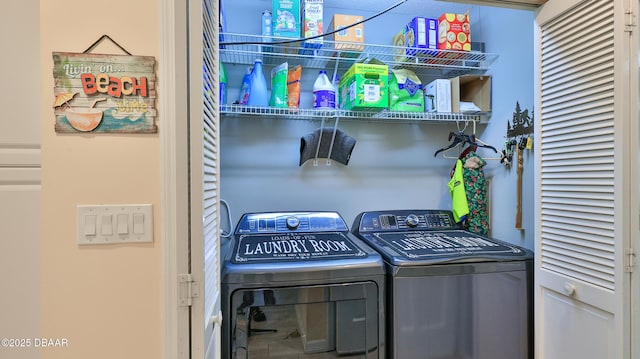 2942 Sea Oats Cir, Daytona Beach, FL 32118 - laundry area featuring washer and dryer and laundry area