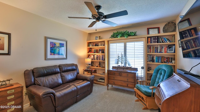 2942 Sea Oats Cir, Daytona Beach, FL 32118 - interior space featuring a textured ceiling, ceiling fan, and carpet