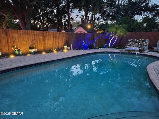 59 Arroyo Pkwy, Ormond Beach, FL 32174 - view of swimming pool with a fenced backyard