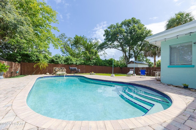 59 Arroyo Pkwy, Ormond Beach, FL 32174 - view of swimming pool with a fenced backyard and a patio area