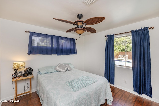 59 Arroyo Pkwy, Ormond Beach, FL 32174 - bedroom with wood finished floors and a ceiling fan
